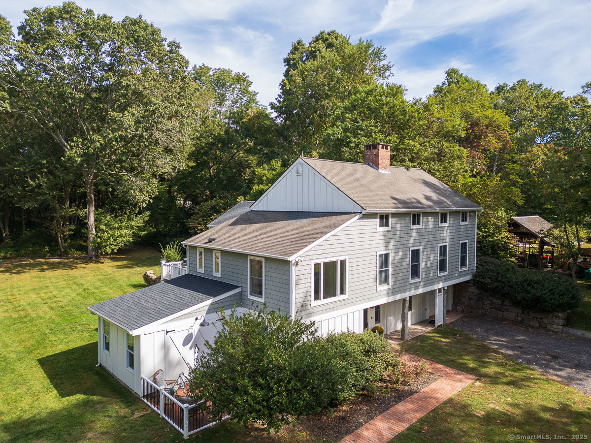 147 Pequot Avenue Groton, CT 06355 - Photo 3 of 39 a aerial view of a house with yard porch and furniture