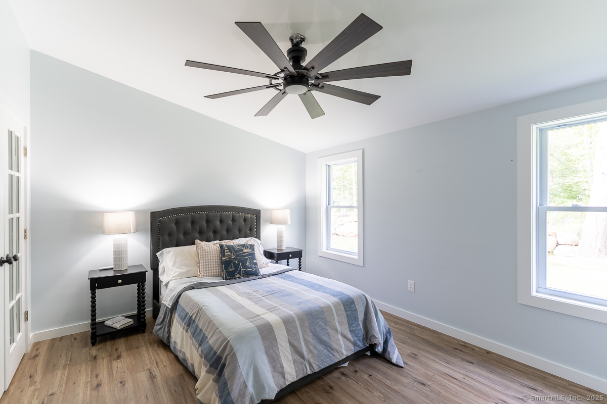 147 Pequot Avenue Groton, CT 06355 - Photo 30 of 39 a bedroom with a bed and window