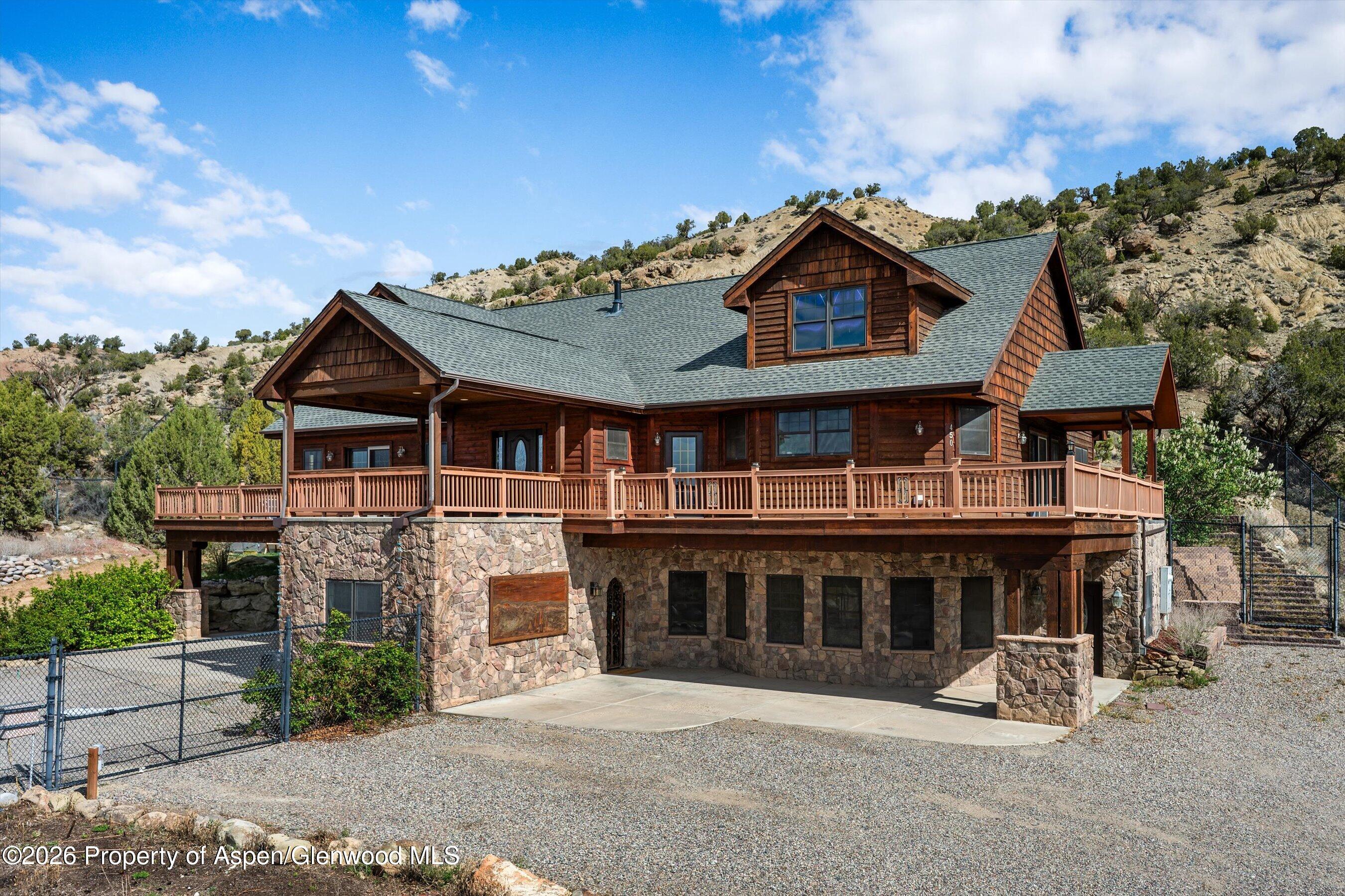 450 Summer Falls Road Silt, CO 81652 - Photo 2 of 50 a view of house with yard and entertaining space