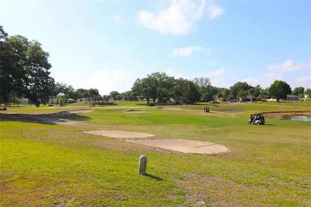a view of a swimming pool with an outdoor space