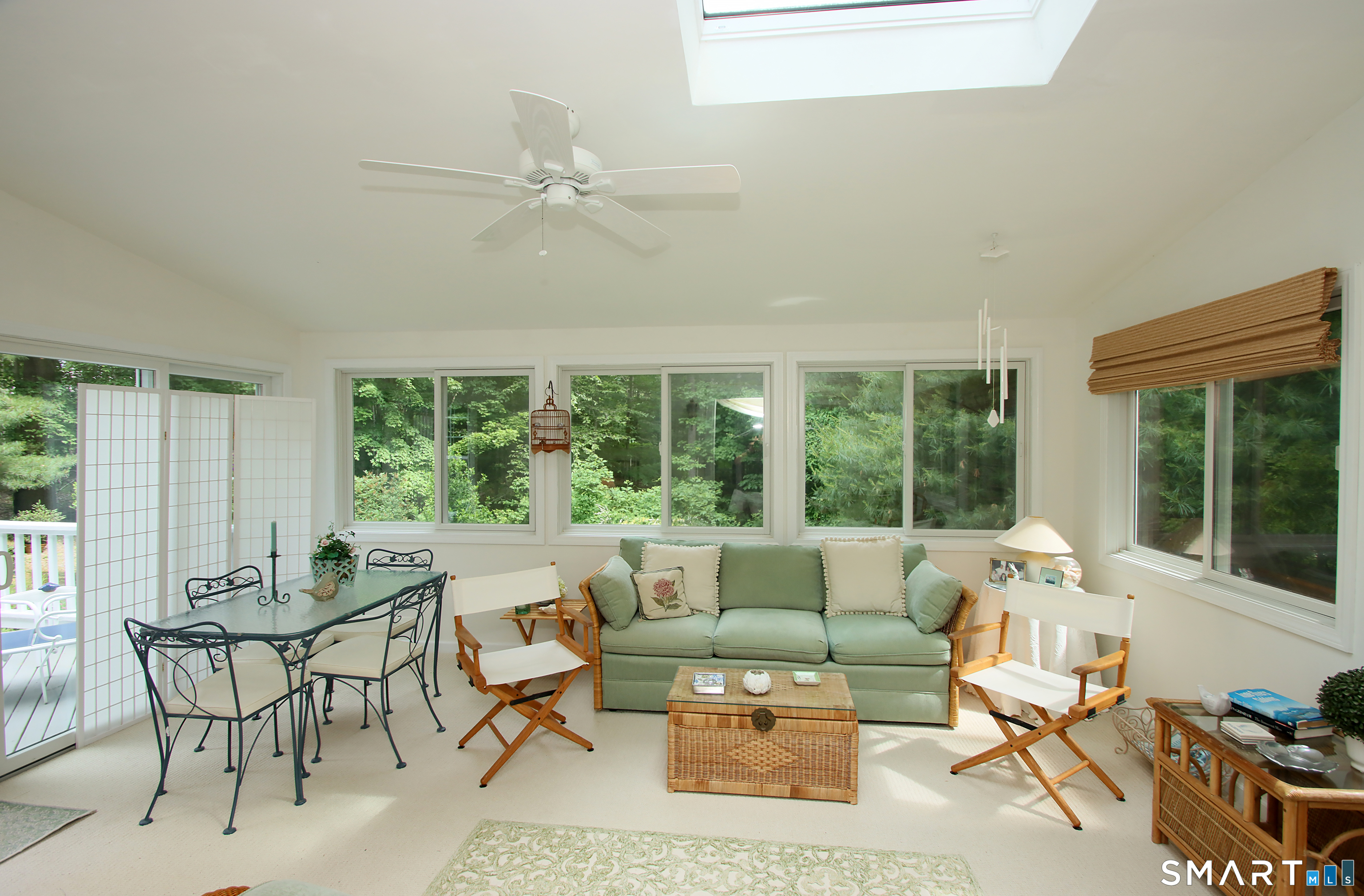 49 Hammonassett Meadows Road Madison, CT 06443 - Photo 8 of 31 The sunroom has electric heat and can be used year round