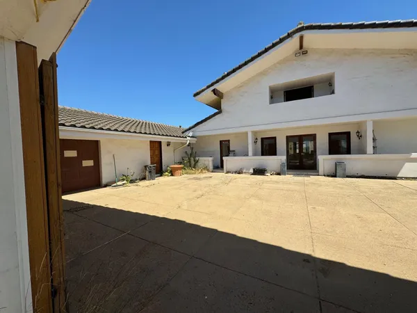 a house view with a outdoor space