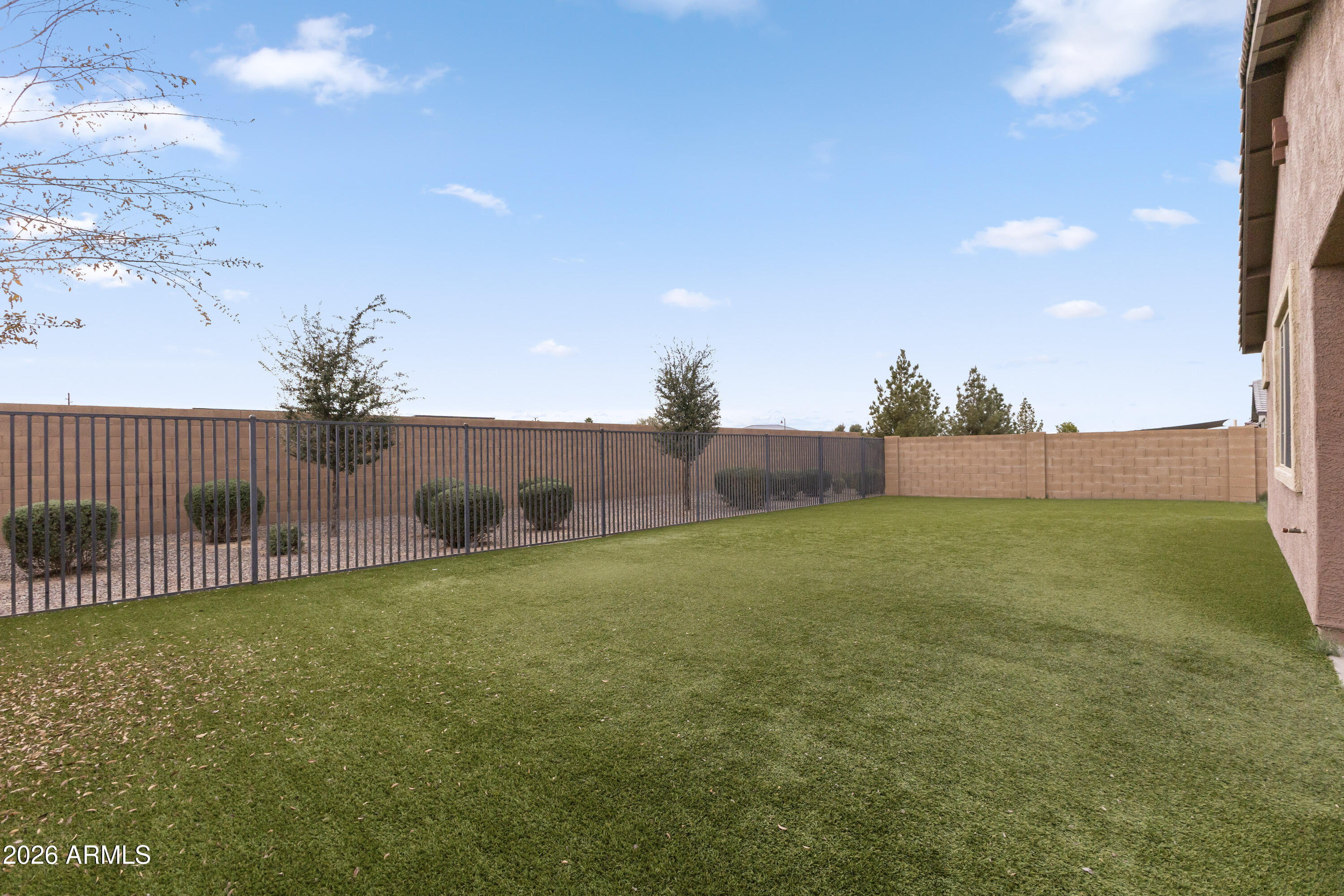 21303 East Estrella Road Queen Creek, AZ 85142 - Photo 29 of 32 a view of a backyard