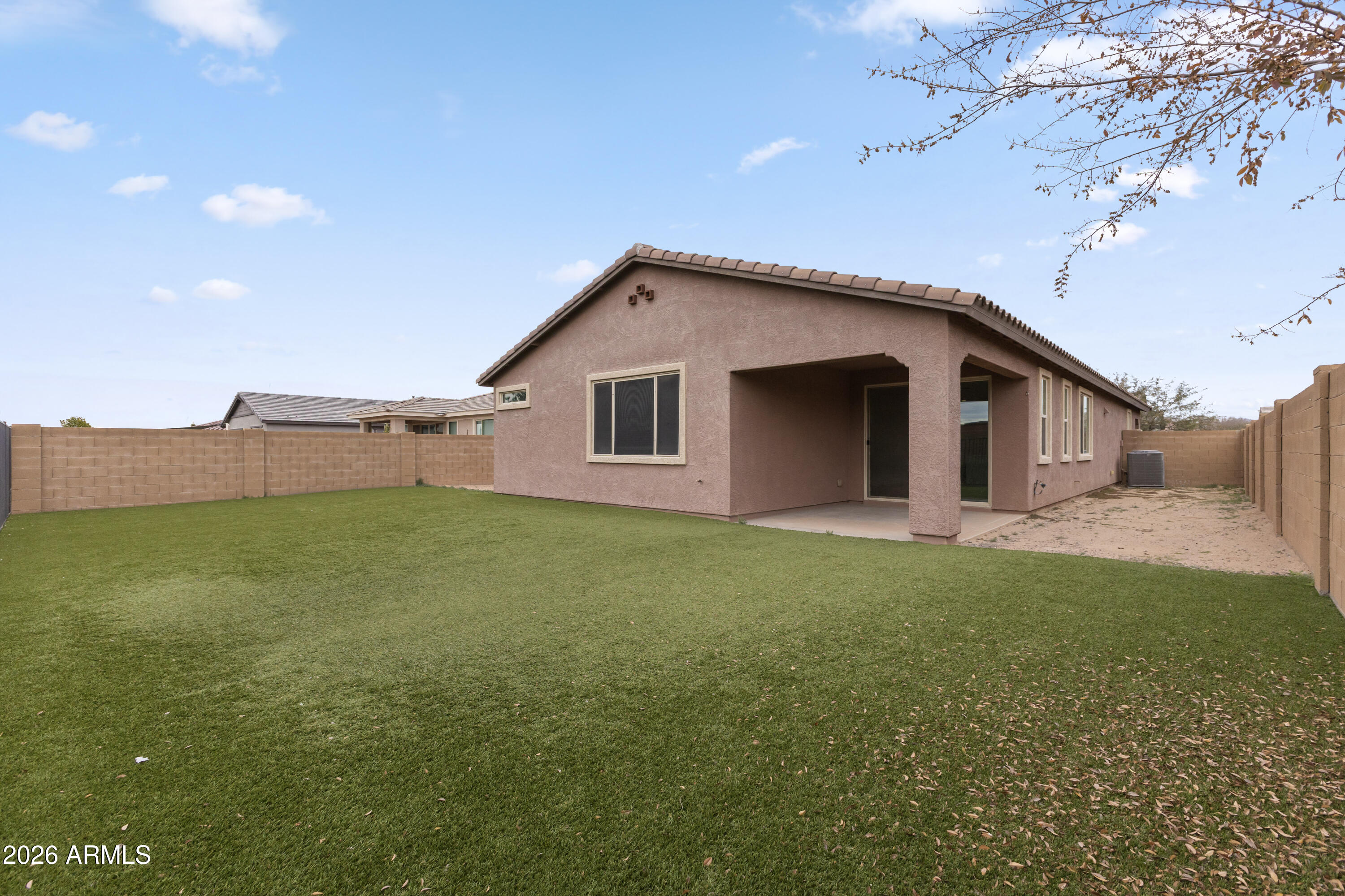 21303 East Estrella Road Queen Creek, AZ 85142 - Photo 30 of 32 a view of a backyard of the house