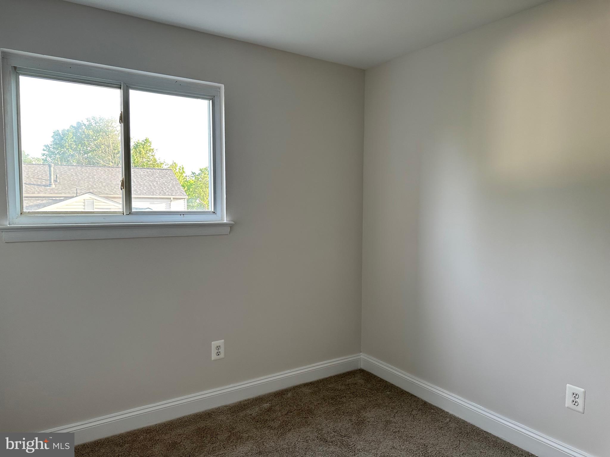 17209 Chiswell Road Poolesville, MD 20837 - Photo 18 of 21 an empty room with a window