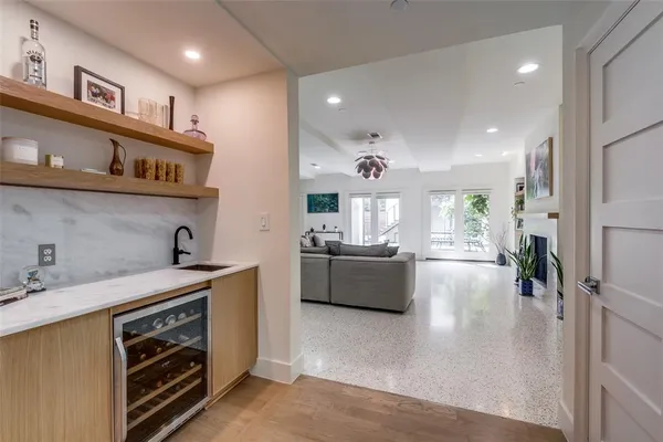 a kitchen with stainless steel appliances granite countertop a stove and a sink
