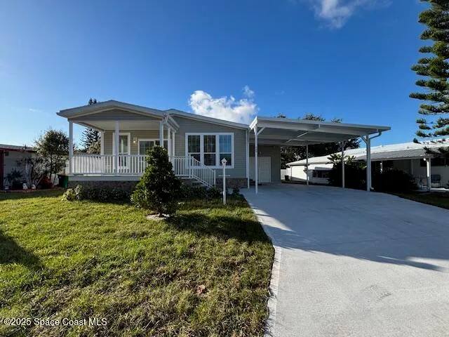 $323,500 | 723 Hyacinth Circle, Barefoot Bay, FL 32976