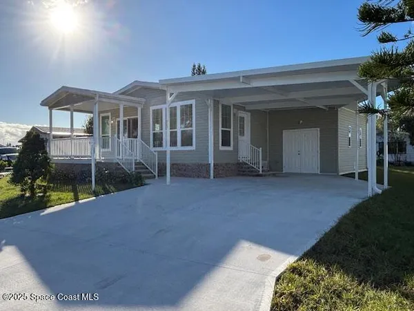 a view of a house with a garden