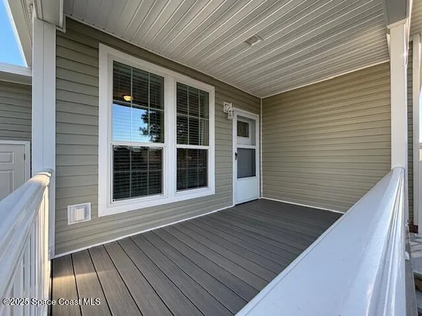 a view of a house with wooden floor