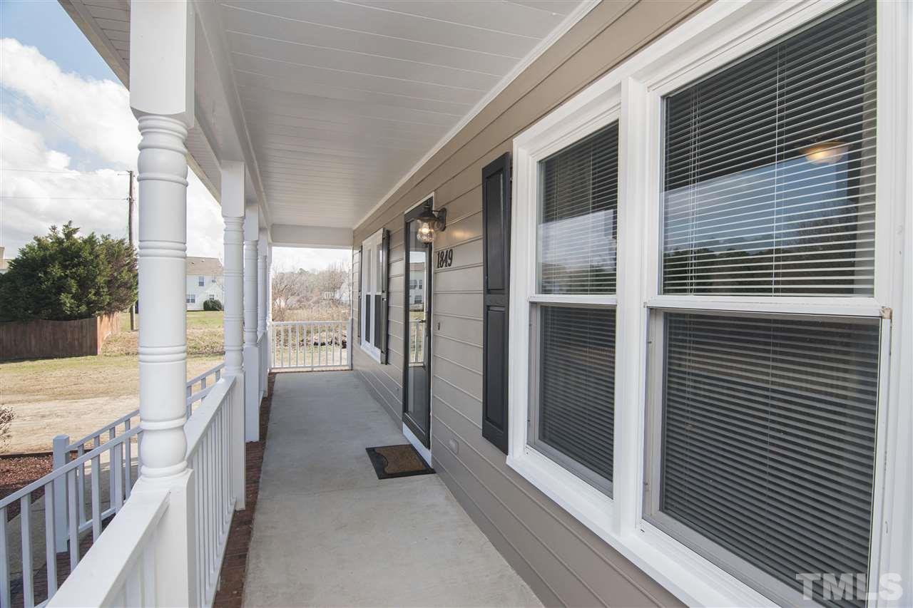 1849 Sanders Road Willow Spring, NC 27592 - Photo 4 of 25 a view of a balcony