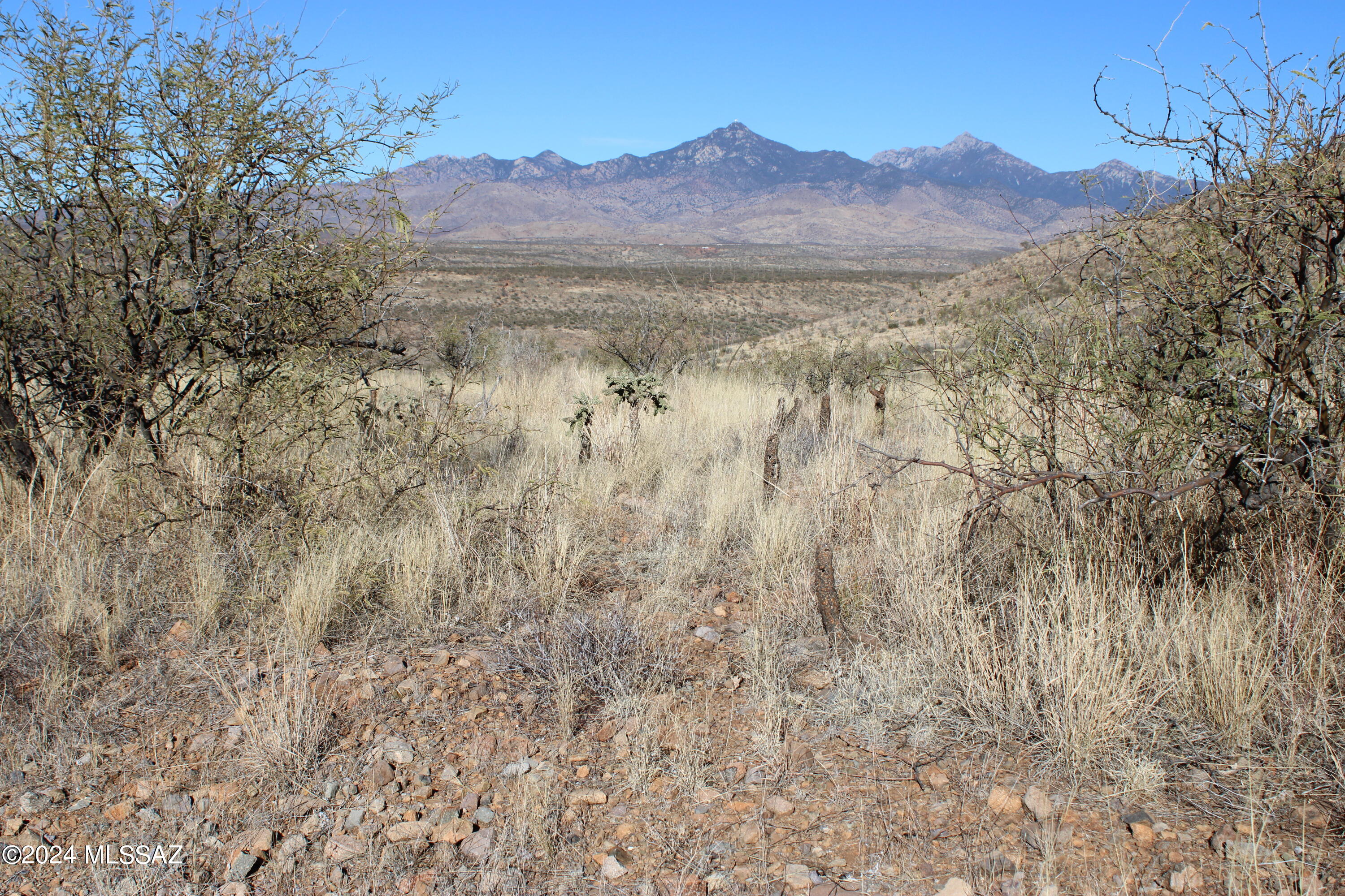 1815 Círculo Tortuga, Unit 21 Rio Rico, AZ 85648 - Photo 4 of 5 a view of mountain with lake in the background