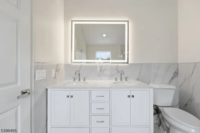 a view of a house with a door and wooden floor