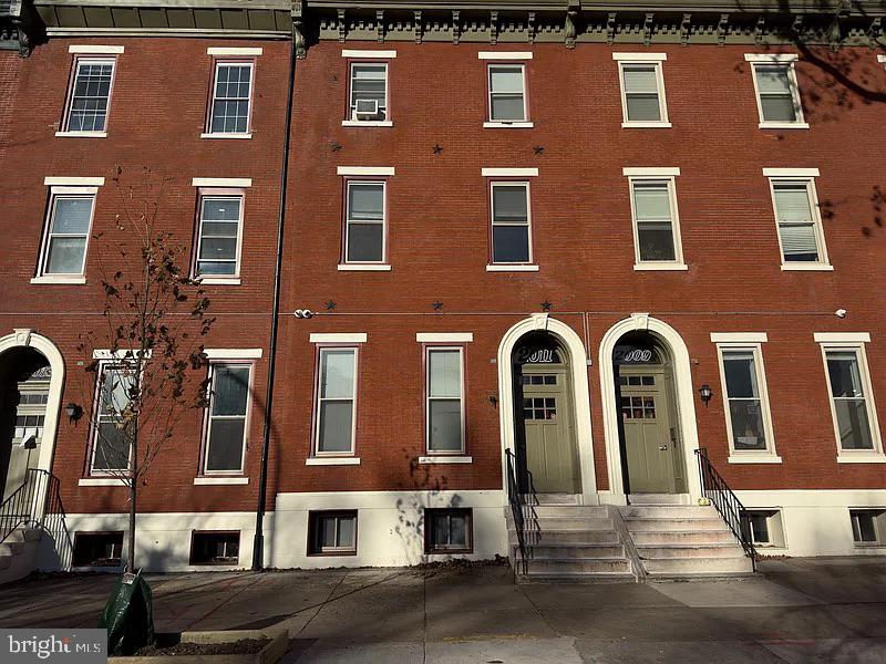 2011 Green Street, Unit 2R Philadelphia, PA 19130 - Photo 15 of 15 a view of a building with many windows