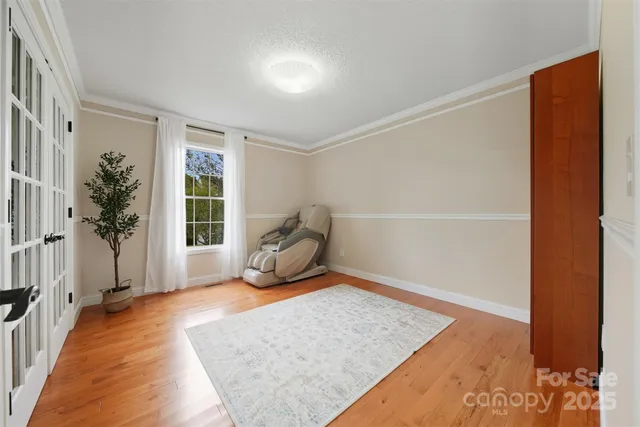 a view of a livingroom with furniture and front door