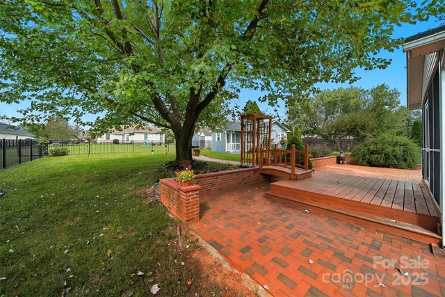 a view of a park with large trees