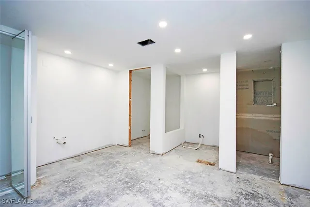 an empty room with windows