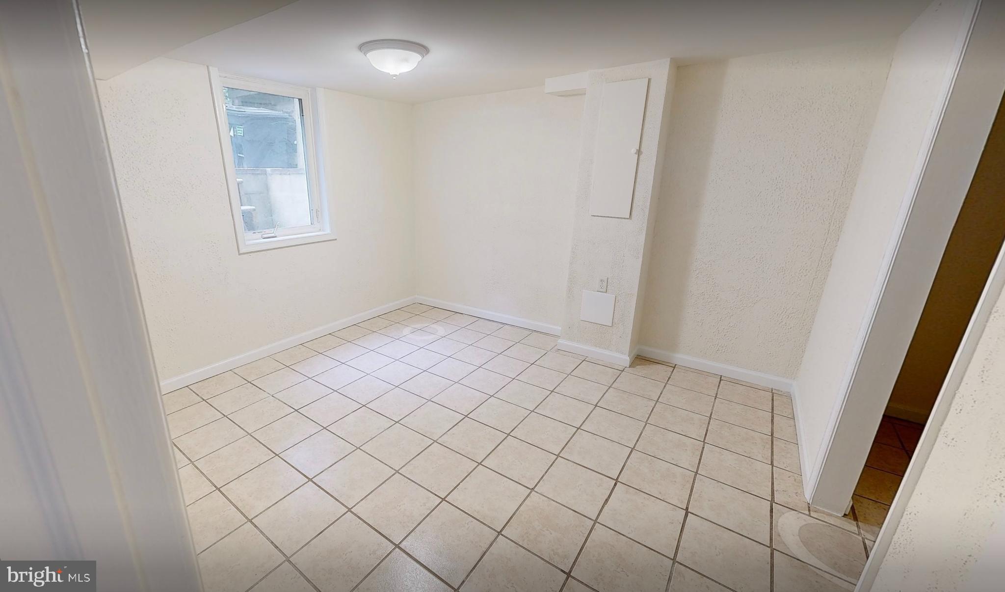 11707 Dewey Road Silver Spring, MD 20906 - Photo 6 of 11 LL bedroom