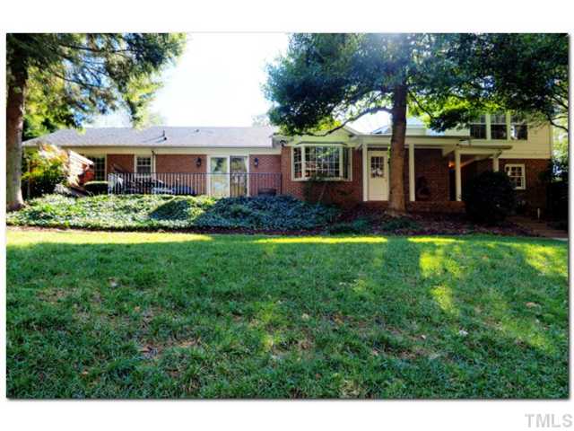 5601 Shadowbrook Drive Raleigh, NC 27612 - Photo 17 of 23 View showing the rear exterior of home, four sides brick!!