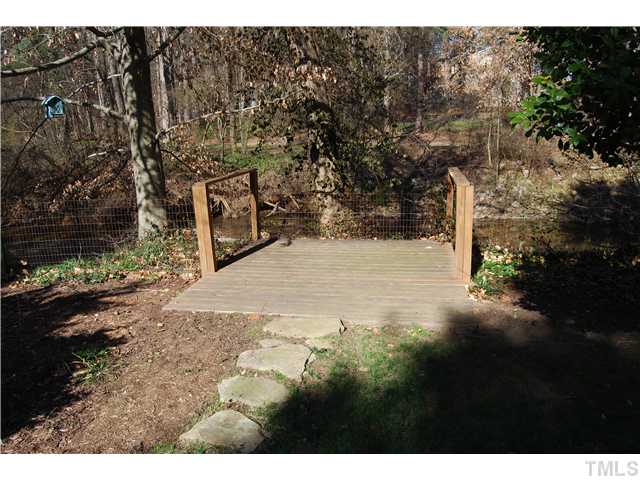 5601 Shadowbrook Drive Raleigh, NC 27612 - Photo 20 of 23 Awesome deck overlooking the tranquil creek!!
