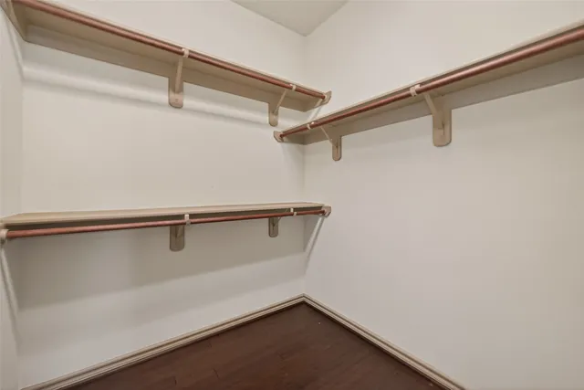 a view of a room with racks on the wall