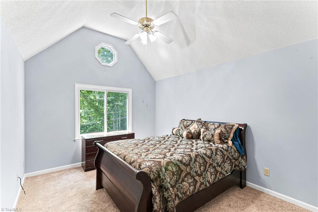 2605 Gordon Road High Point, NC 27265 - Photo 11 of 20 Primary suite with vaulted ceiling