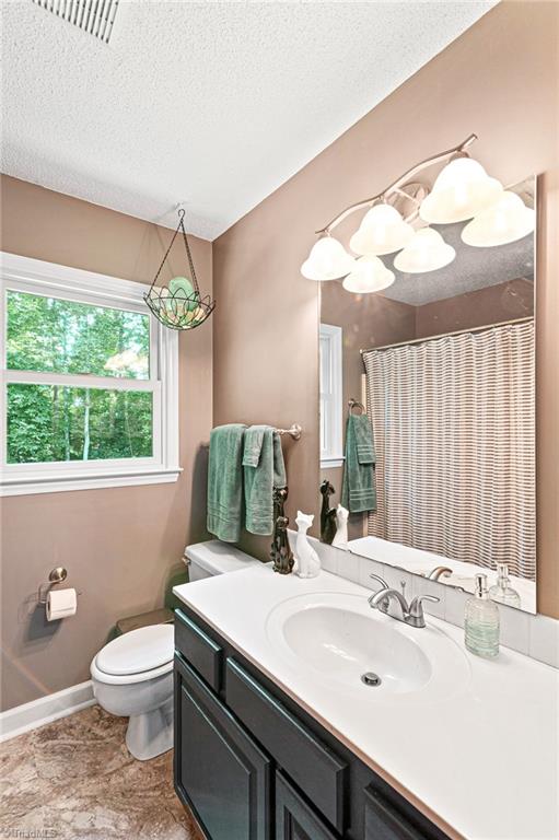 2605 Gordon Road High Point, NC 27265 - Photo 14 of 20 Primary bathroom with tub and shower