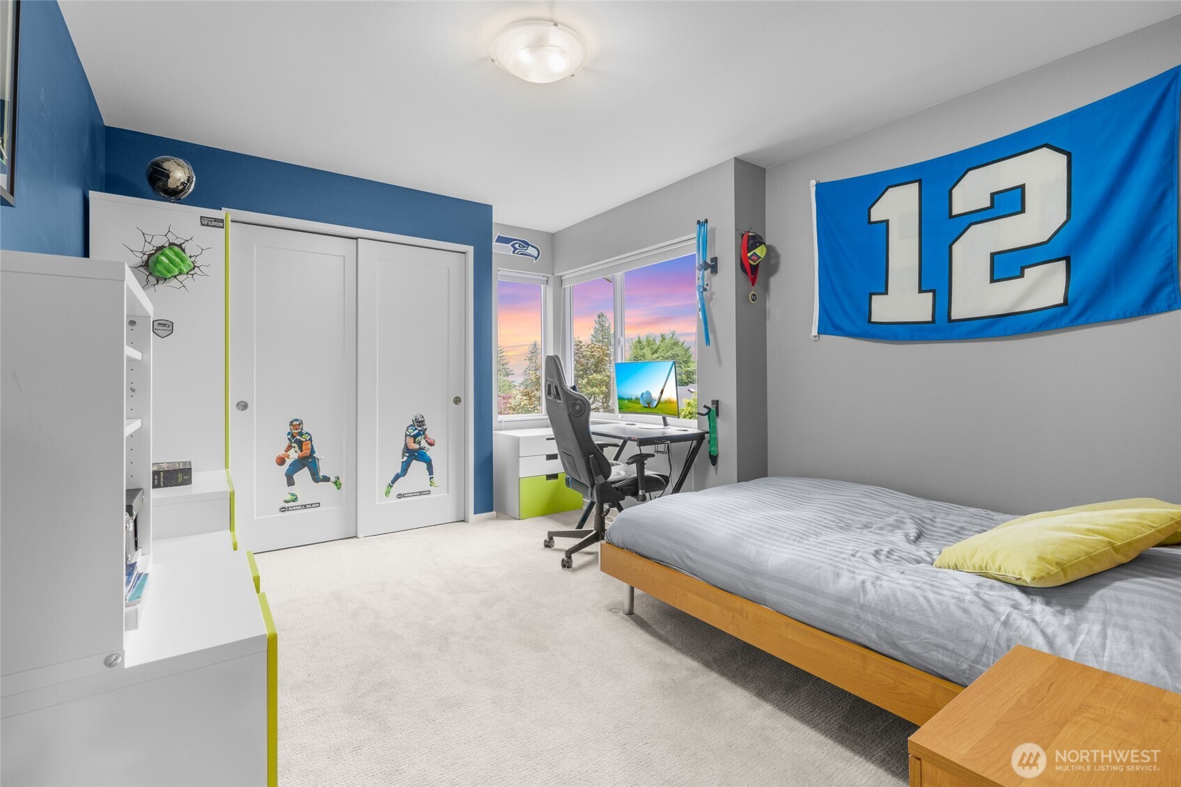 22326 2nd Place Southeast Bothell, WA 98021 - Photo 28 of 40 a bedroom with a bed and a table in it