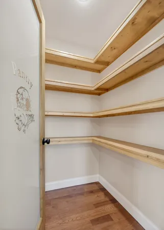a view of a room with rack on the wall