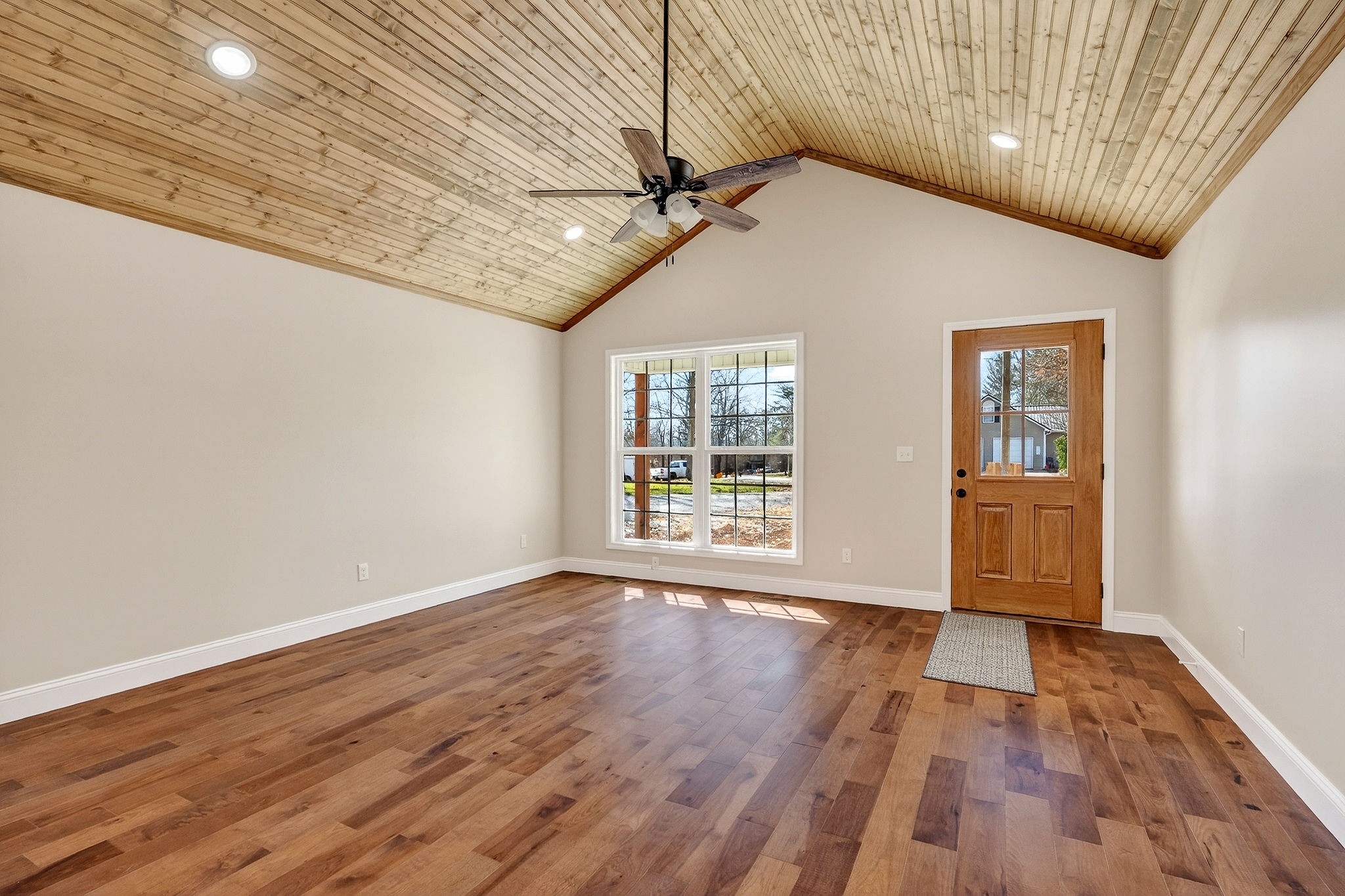270 Rich Loop Sparta, TN 38583 - Photo 15 of 41 a view of an empty room with wooden floor and a window