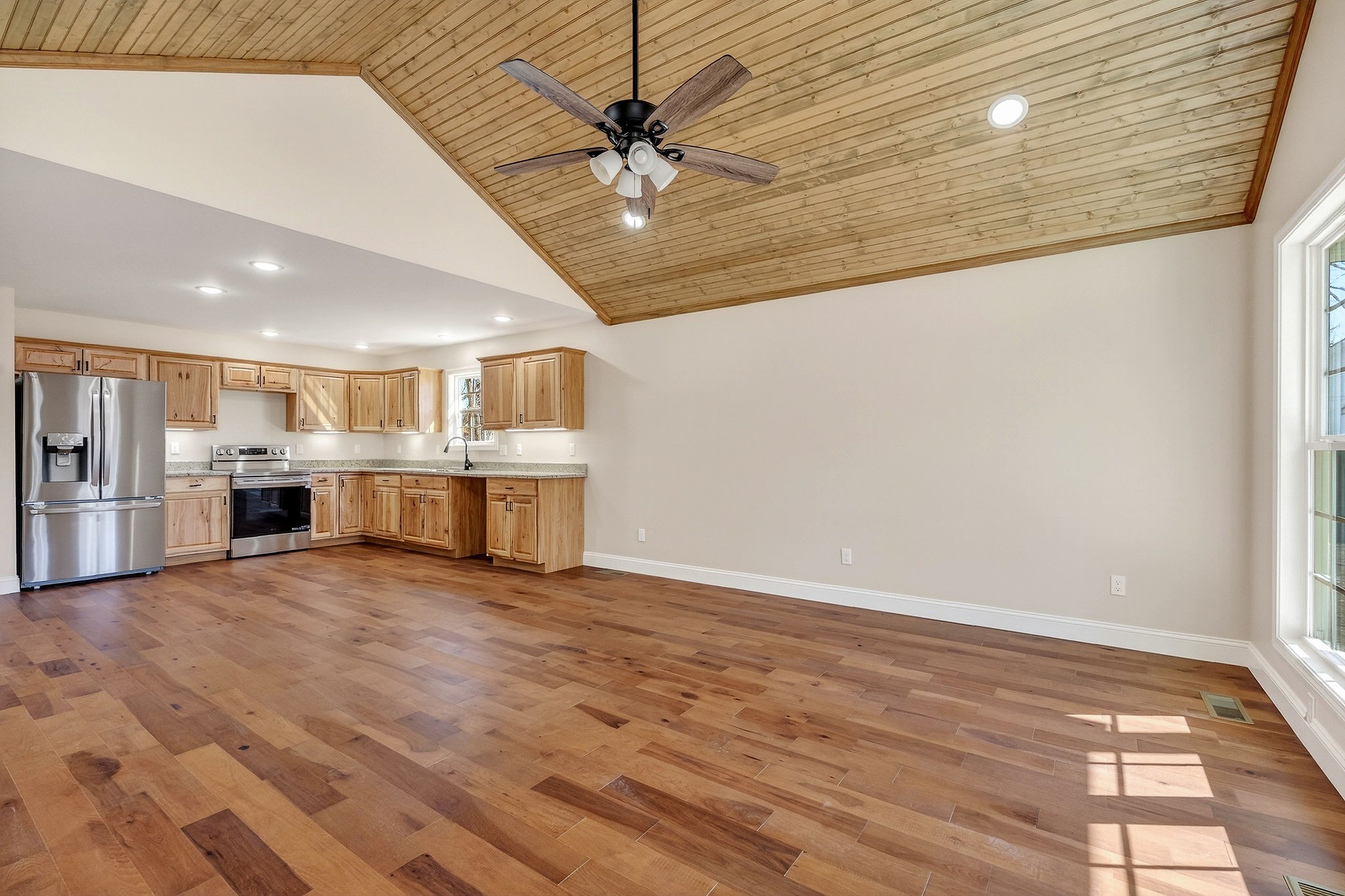 270 Rich Loop Sparta, TN 38583 - Photo 16 of 41 a view of an empty room with kitchen and a window
