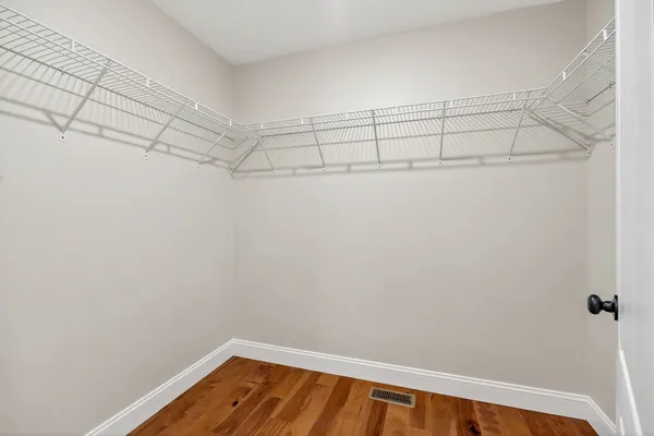 a view of a room with racks on the wall