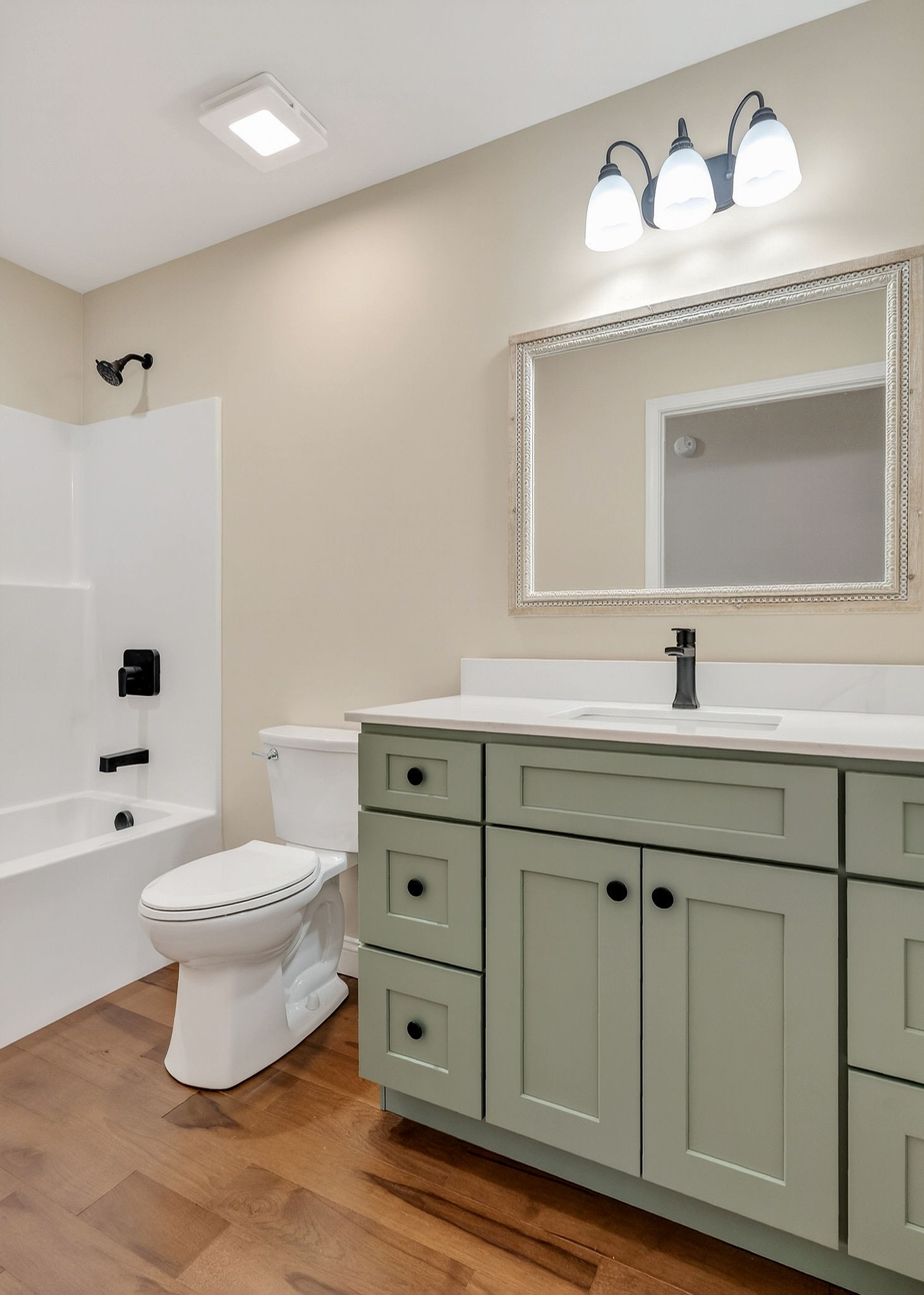 270 Rich Loop Sparta, TN 38583 - Photo 30 of 41 a bathroom with a toilet sink and mirror