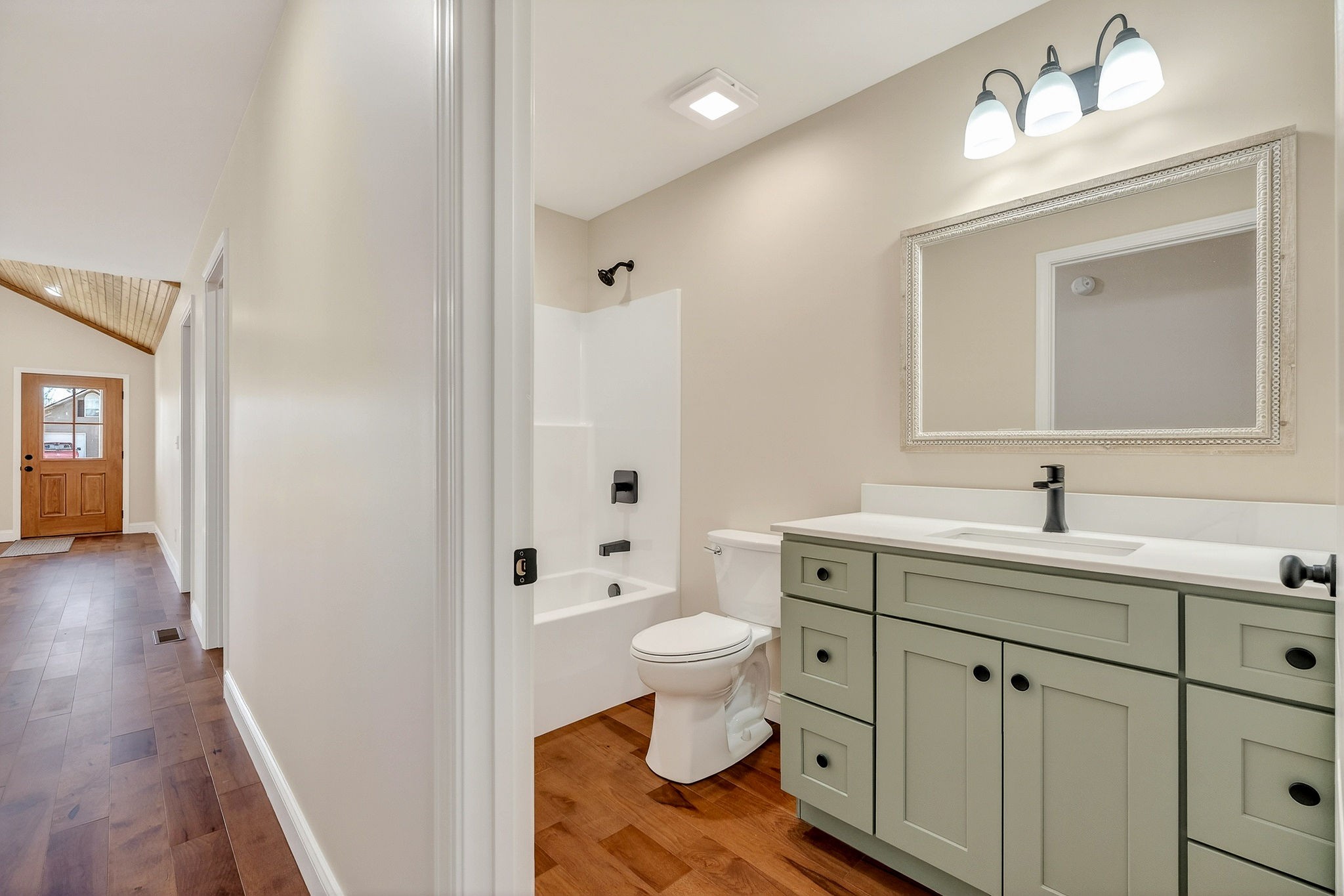 270 Rich Loop Sparta, TN 38583 - Photo 31 of 41 a bathroom with a toilet sink and mirror