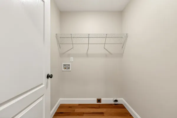 a view of a room with racks on the wall