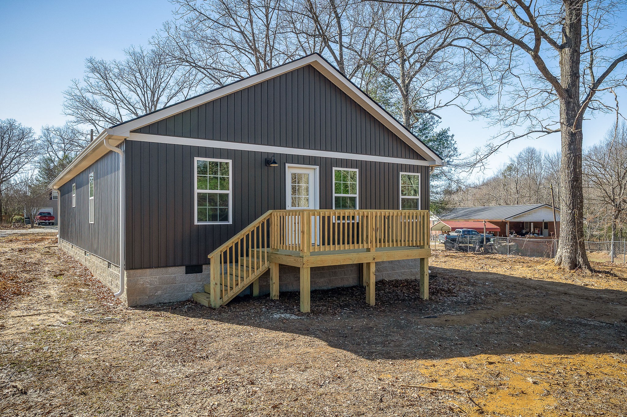 270 Rich Loop Sparta, TN 38583 - Photo 40 of 41 a view of a house with a yard chairs and wooden fence
