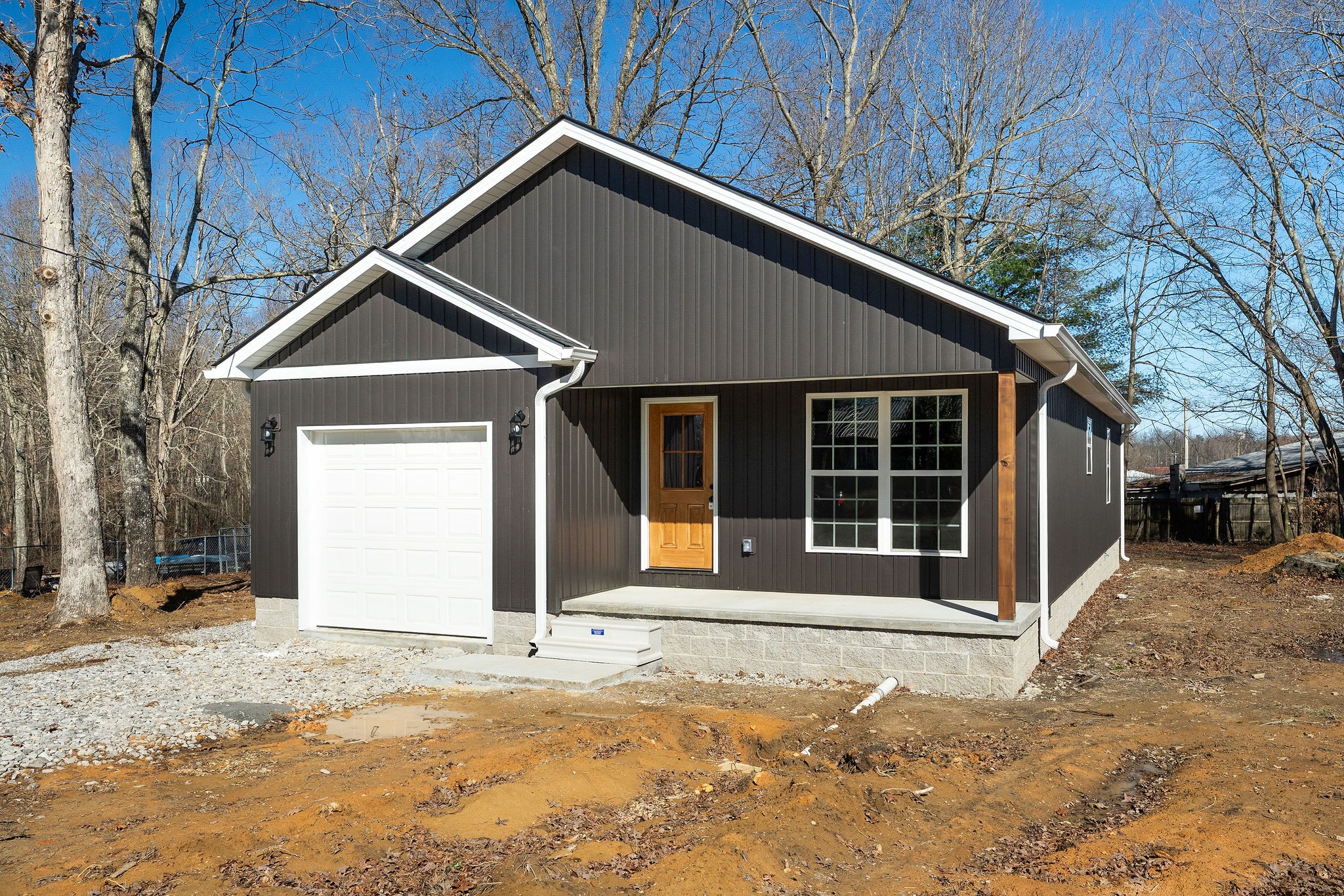 270 Rich Loop Sparta, TN 38583 - Photo 4 of 41 a front view of a house with a yard and garage