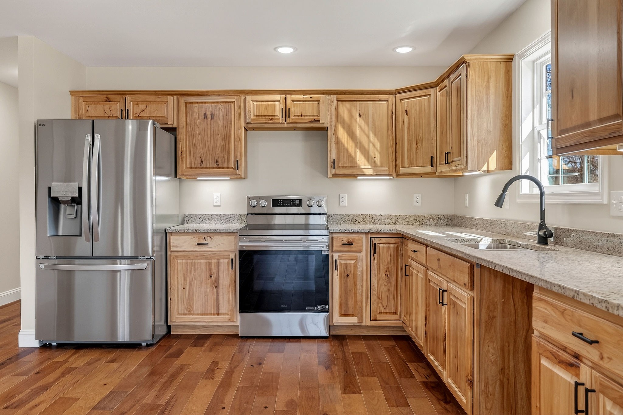 270 Rich Loop Sparta, TN 38583 - Photo 8 of 41 a kitchen with stainless steel appliances granite countertop a refrigerator and a sink
