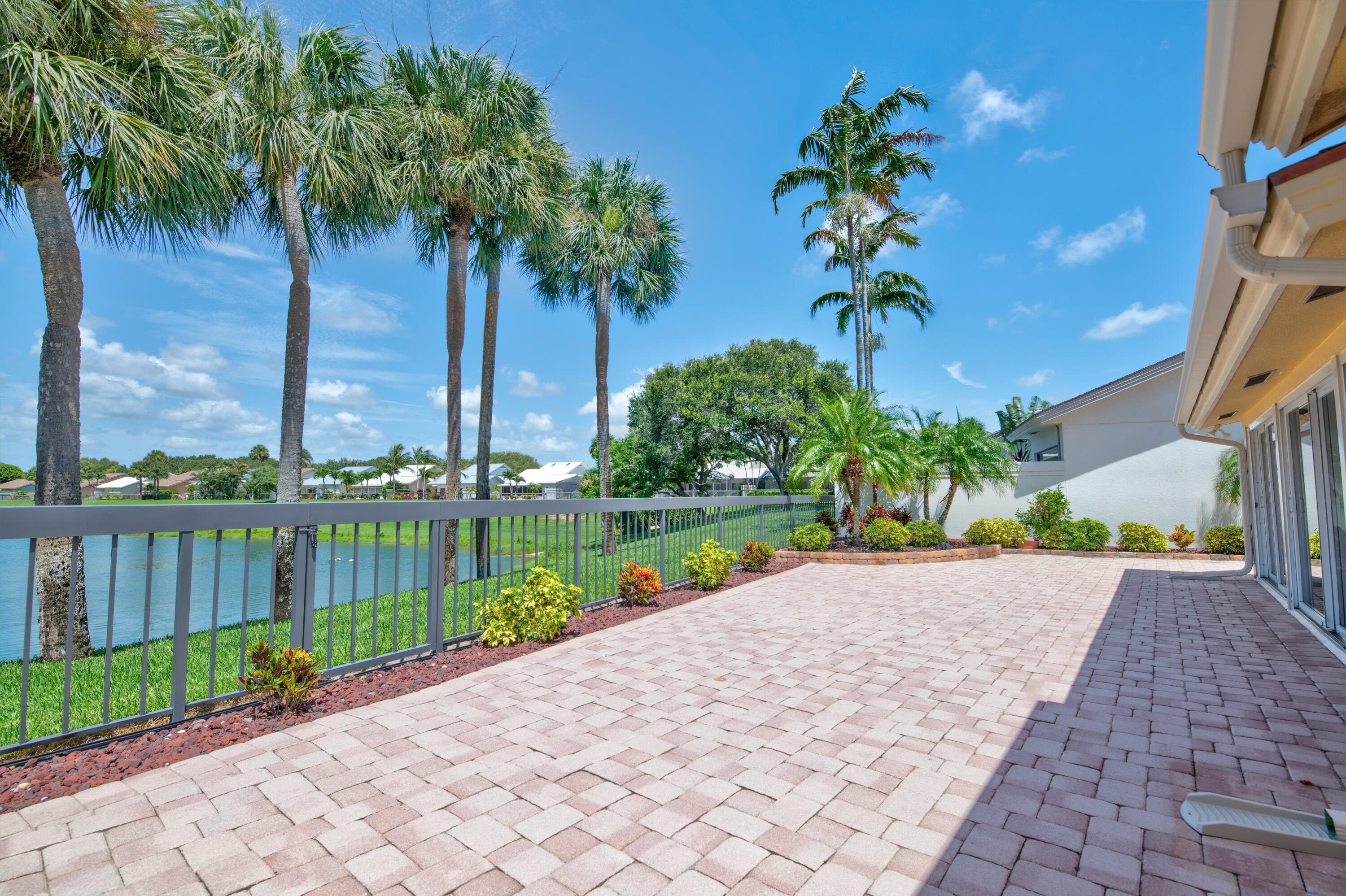 114 Beach Summit Court Jupiter, FL 33477 - Photo 13 of 97 a view of a lake with a garden