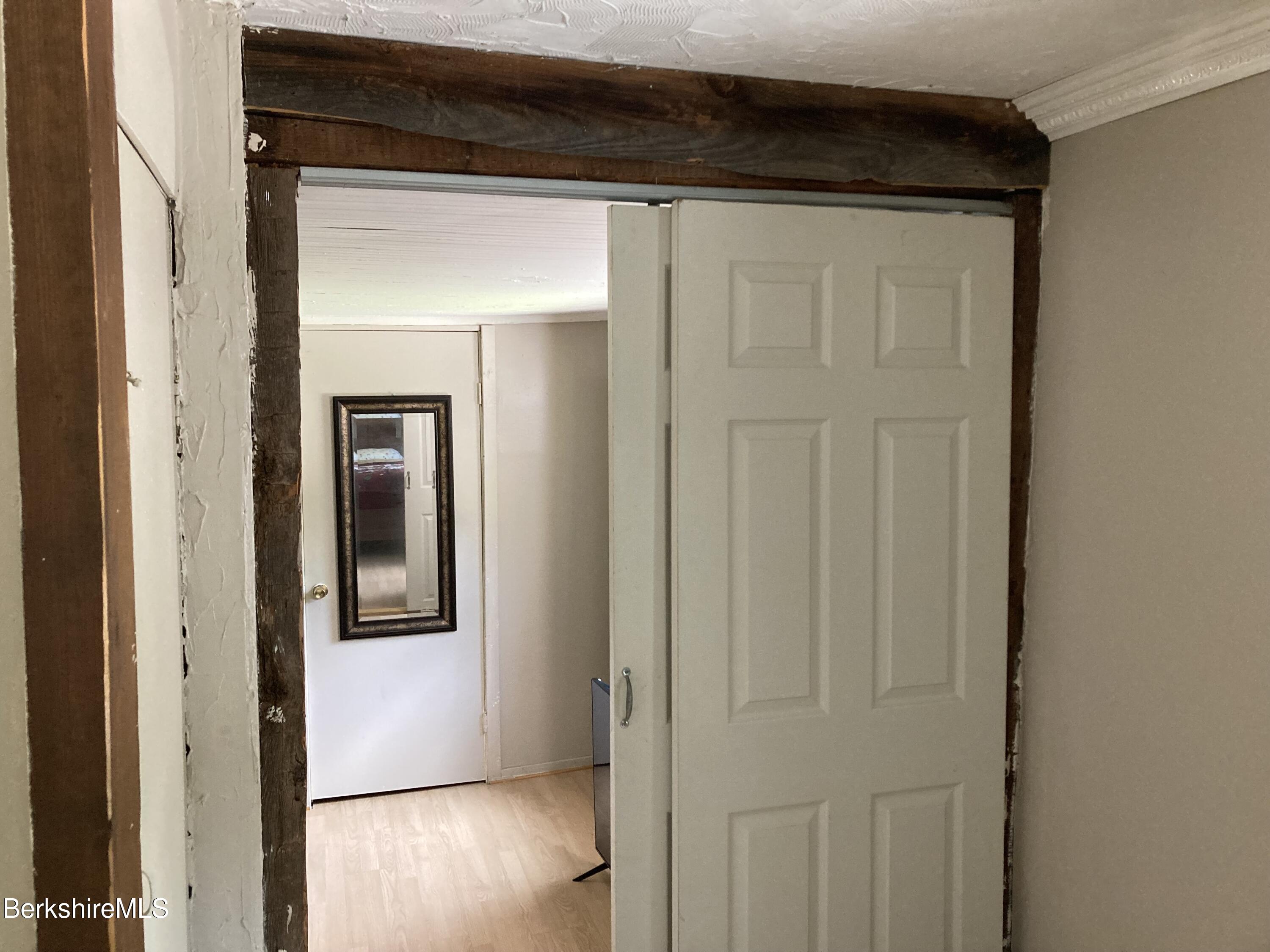 105 County Road Becket, MA 01223 - Photo 66 of 69 a view of a hallway with wooden floor