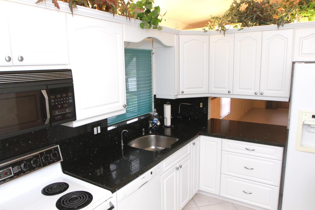 8064 Sweetbriar Way, Unit A Boca Raton, FL 33496 - Photo 2 of 24 IMG_1773