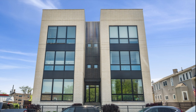 3224 North Elston Avenue, Unit 3N Chicago, IL 60618 - Photo 1 of 22 front view of a brick house with a window