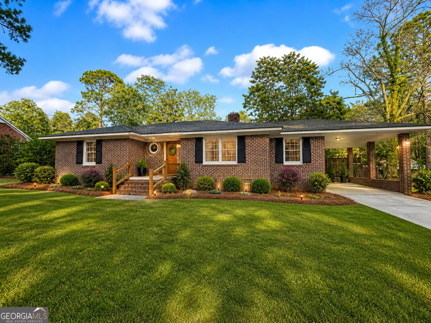 846 Harvey Street Millen, GA 30442 - Photo 1 of 34 a view of a house with backyard and sitting area