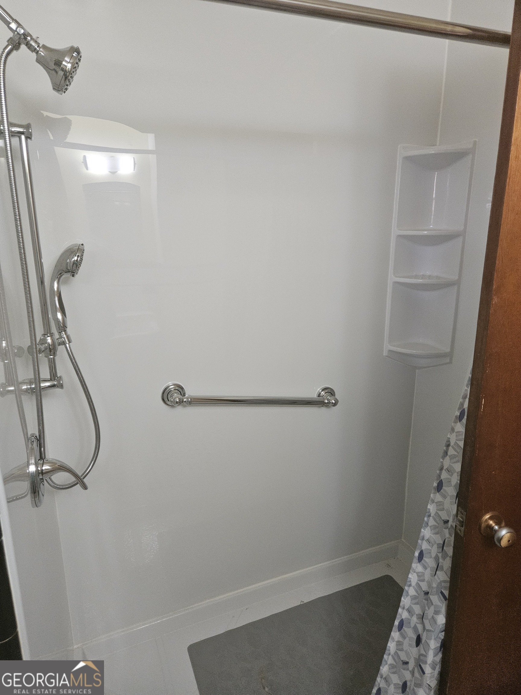 846 Harvey Street Millen, GA 30442 - Photo 11 of 34 a bathroom with a shower