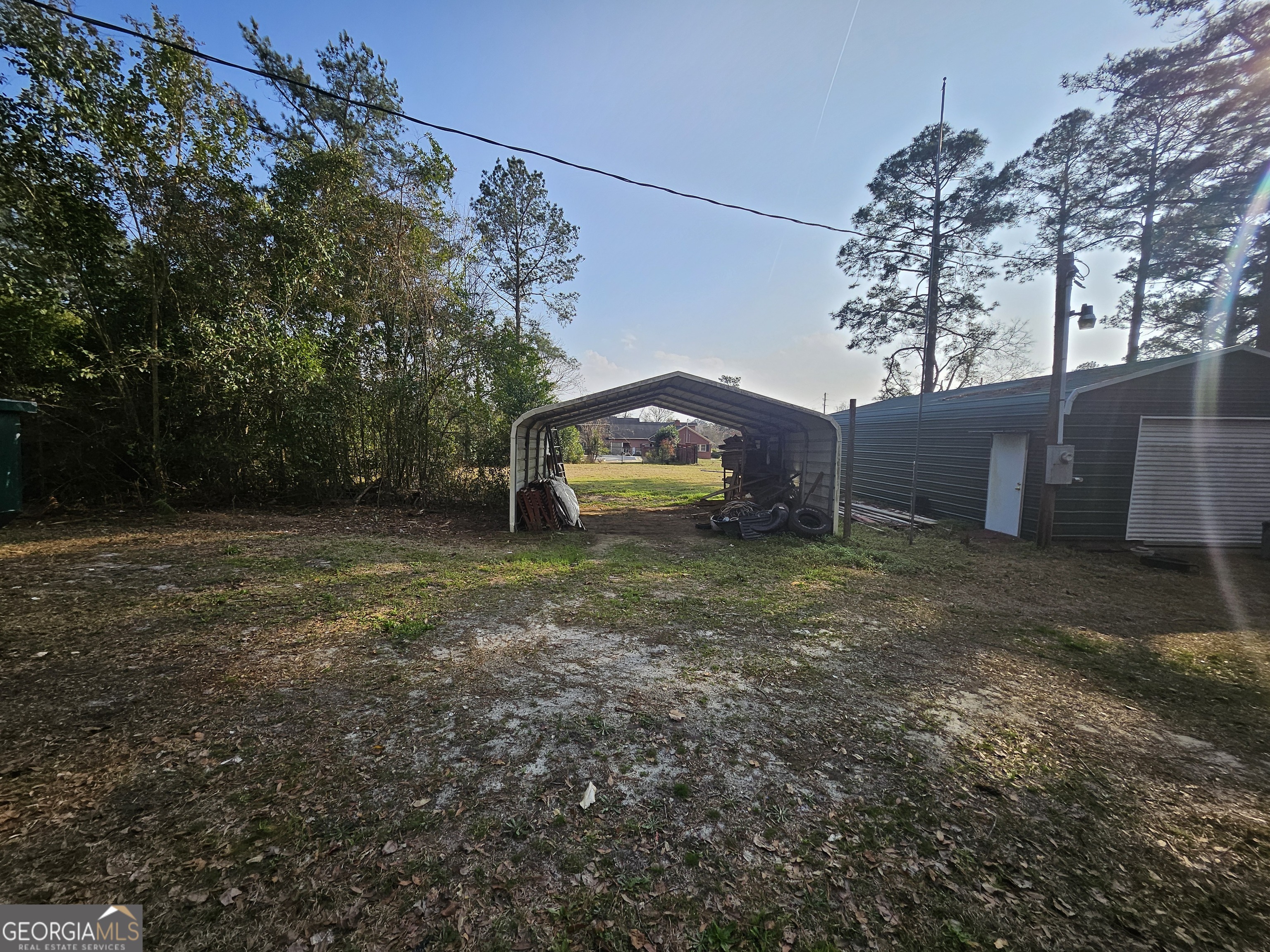 846 Harvey Street Millen, GA 30442 - Photo 24 of 34 a house view with a backyard space