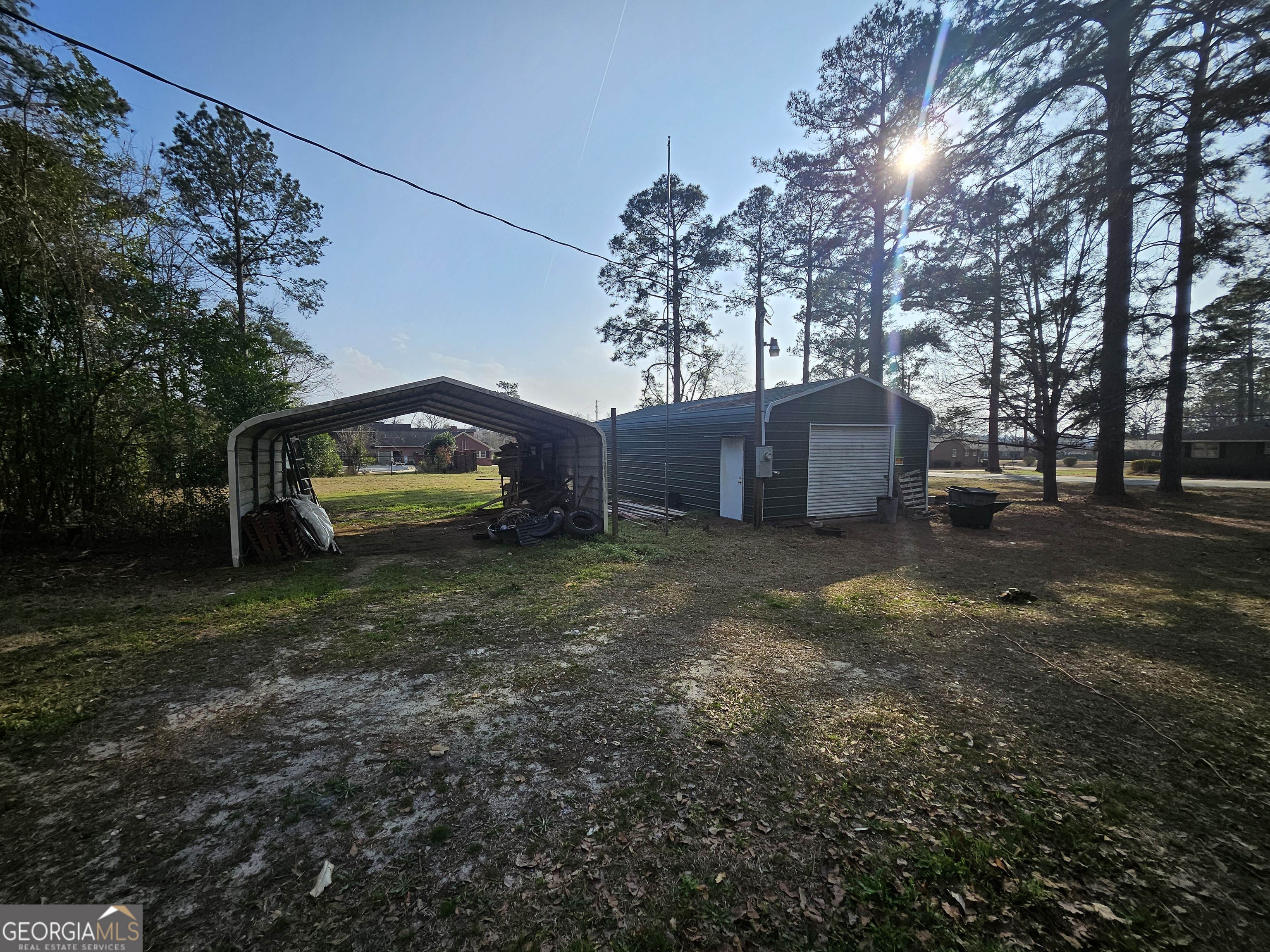 846 Harvey Street Millen, GA 30442 - Photo 25 of 34 a house view with a garden space