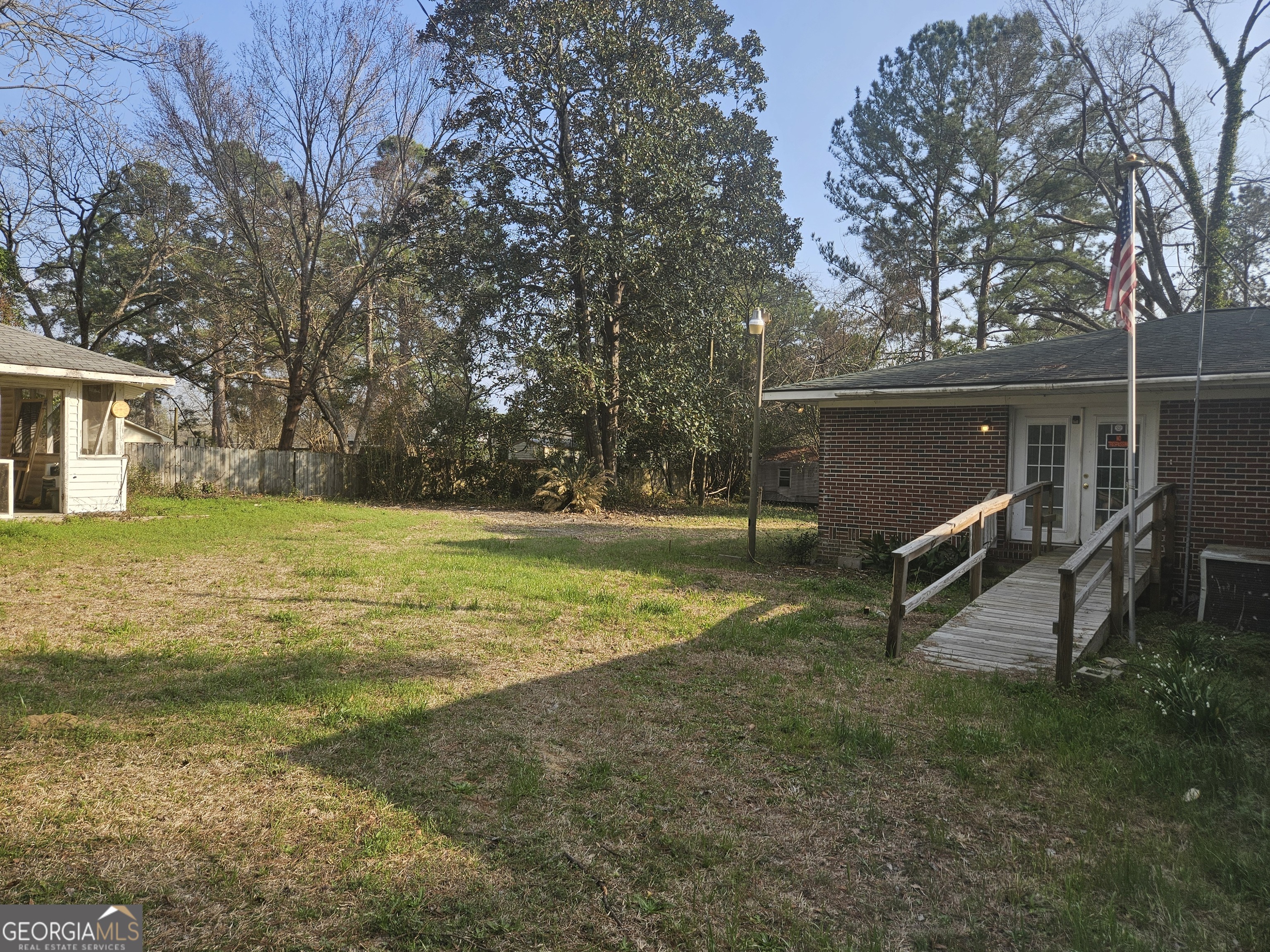 846 Harvey Street Millen, GA 30442 - Photo 30 of 34 a view of a house with a yard