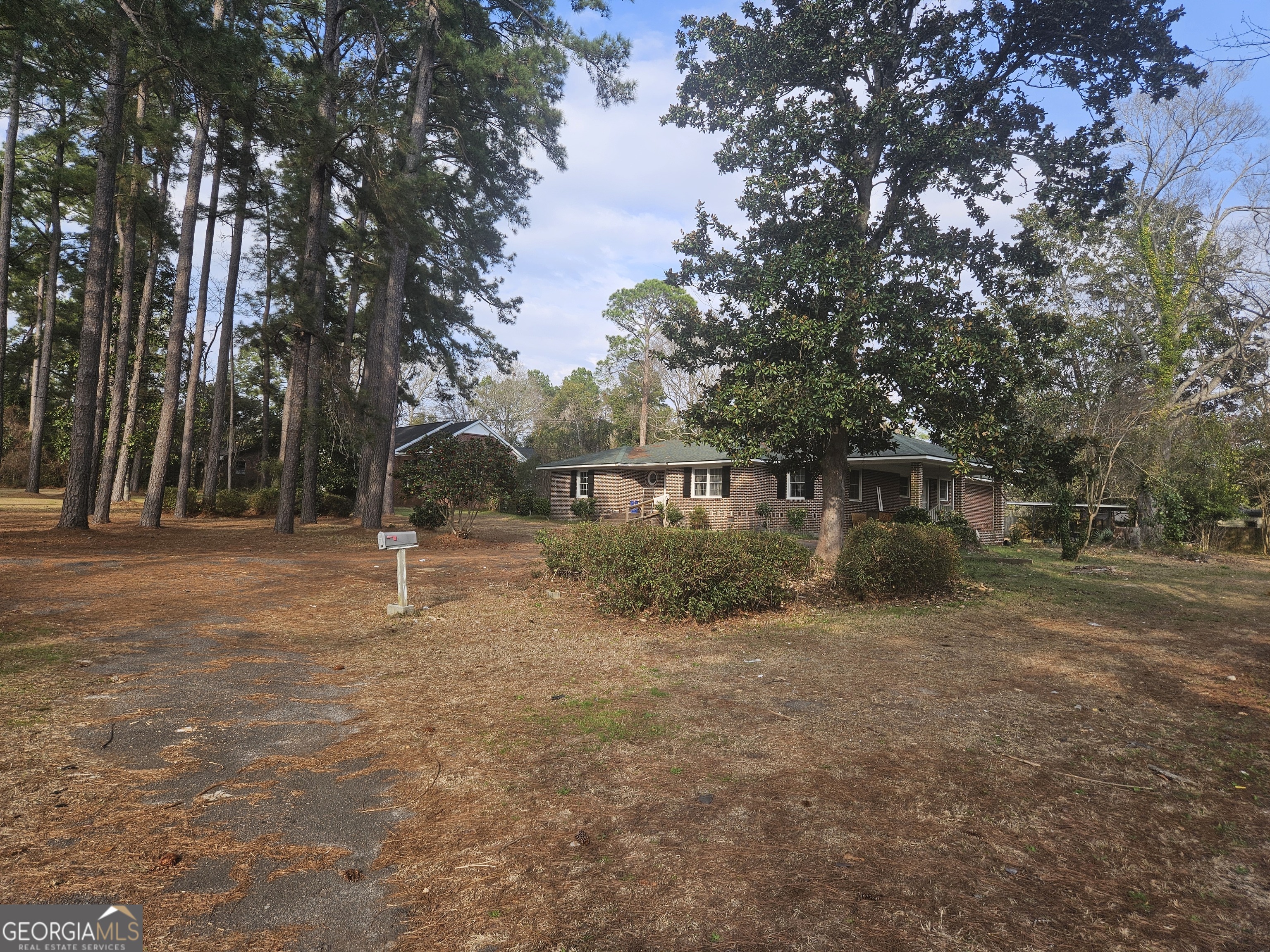 846 Harvey Street Millen, GA 30442 - Photo 33 of 34 a view of a house with a backyard