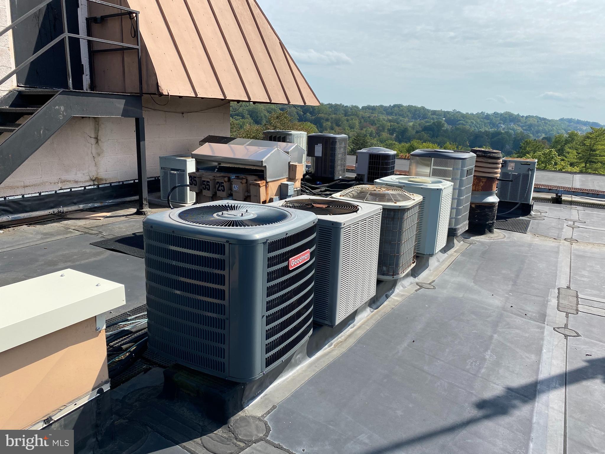 200 Cross Keys Road, Unit R35 Baltimore, MD 21210 - Photo 32 of 35 AC unit on roof - Goodman unit replaced in 2017