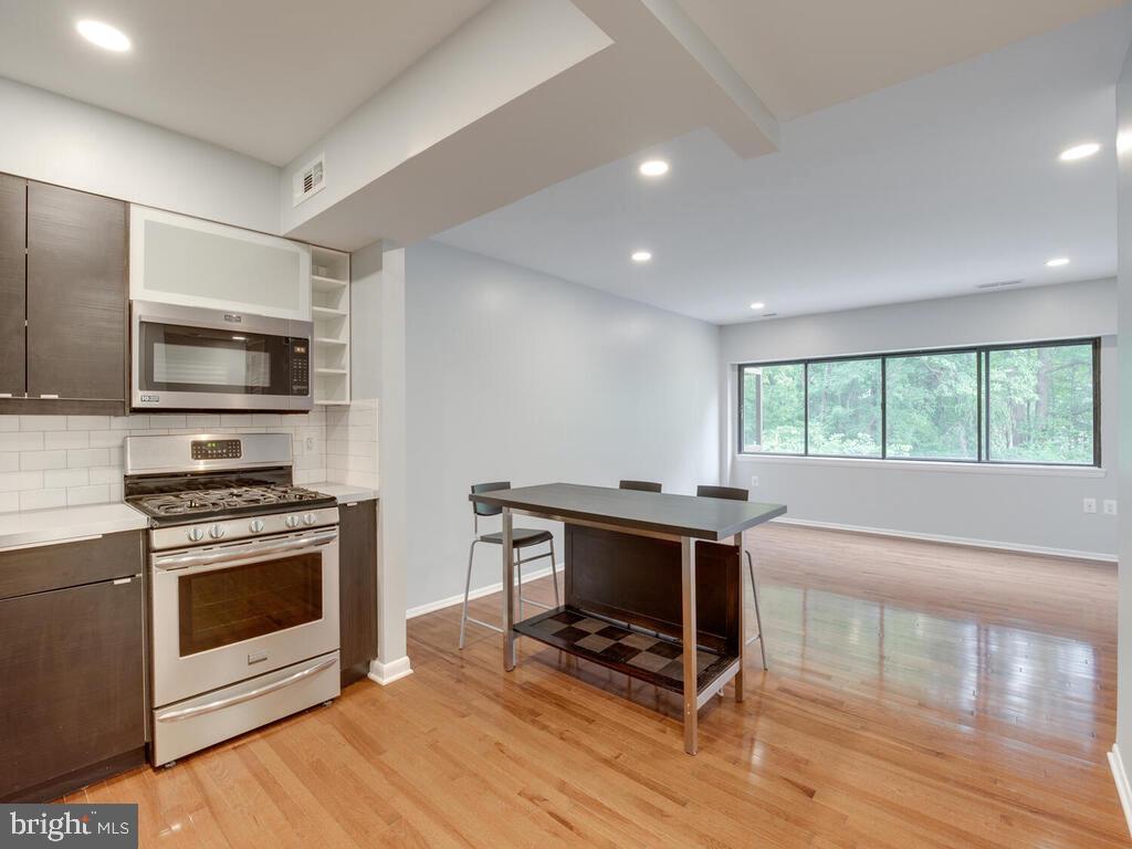 200 Cross Keys Road, Unit R35 Baltimore, MD 21210 - Photo 8 of 35 Open concept kitchen and living room