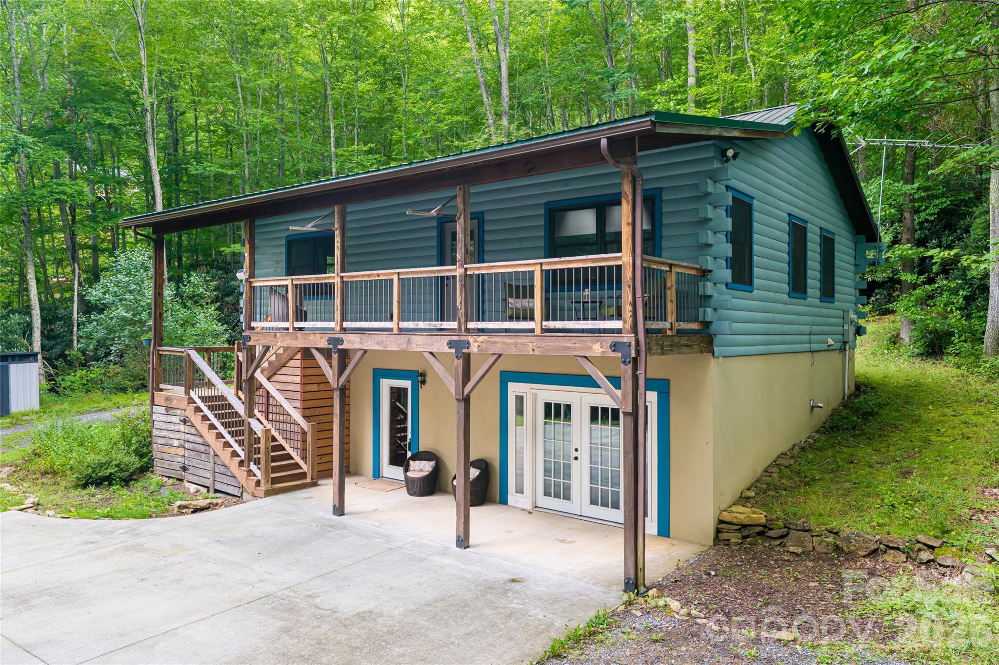 4035 Bald Creek Road Clyde, NC 28721 - Photo 3 of 43 a front view of a house with garden